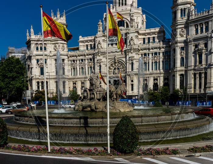 Madrid, Spain - June 17 : The Madrid City Hall On June 17, 2017. A Welcome Refugees Banner Is Displayed On The City Hall.Plaza De Cibeles,