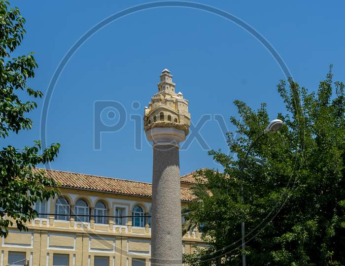 Spain, Cordoba, Low Angle View Of Pillar Against Blue Sky