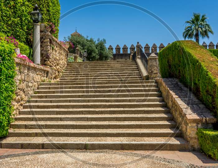 Spanish Steps In Royal Gardens Of The Alcazar De Los Reyes Cristianos Castle In Cordoba, Spain, Europe