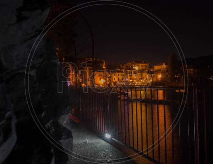 Italy, Lecco, Lake Como, Lovers Walkng Path At Night In Varenna