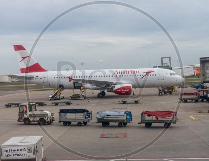 Netherlands, Amsterdam, Schiphol - 30 March, 2018: Austrian Planes At Airport. Schiphol Is One Of The Busiest Airport In Europe.