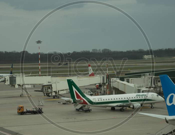 Milan Airport, Italy-April 2, 2018: Alitalia Plane At The Milan Malpensa Airport