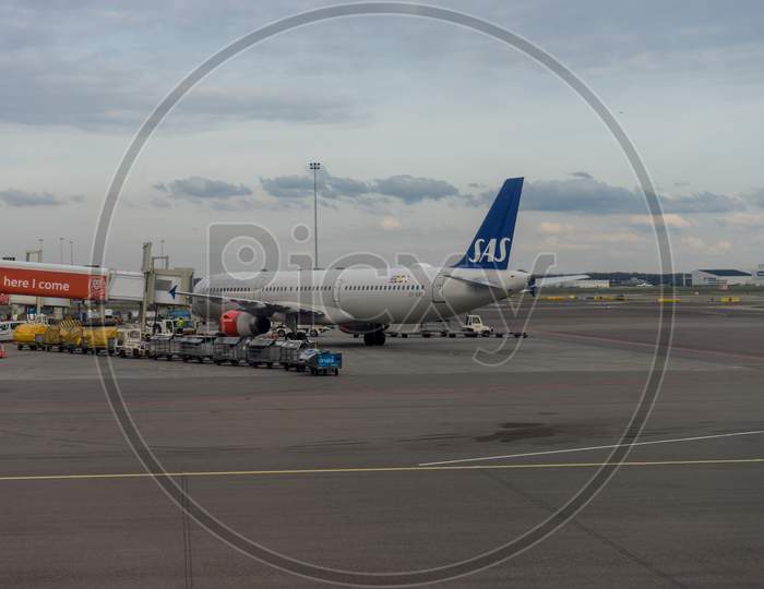 Netherlands, Amsterdam, Schiphol - 30 March, 2018: Sas Scandinavian Planes At Airport. Schiphol Is One Of The Busiest Airport In Europe.