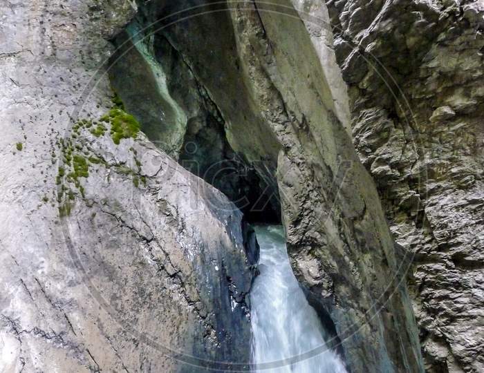 Switzerland, Lauterbrunnen, Close-Up Of Water Flowing Through Rocks