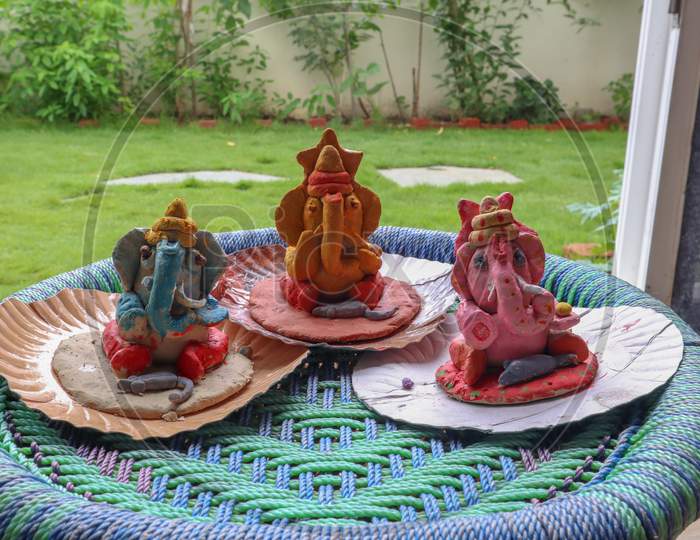 Three Colorful Home Made Lord Ganesha Statues.