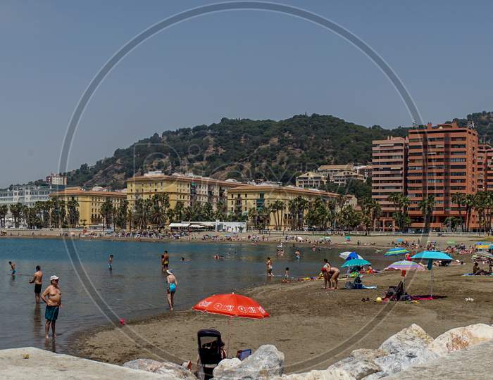 Panoramic View Of The Ocean At Malagueta Beach With Rocks At Malaga, Spain, Europe