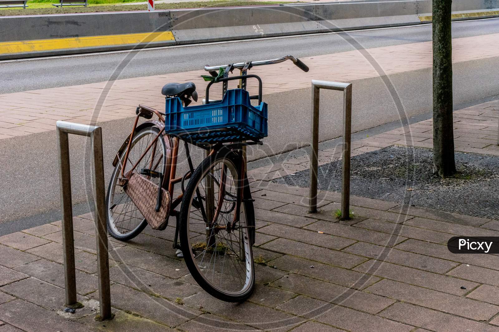 Netherlands, Rotterdam,  Bucyle With Basket At A Parking Lot