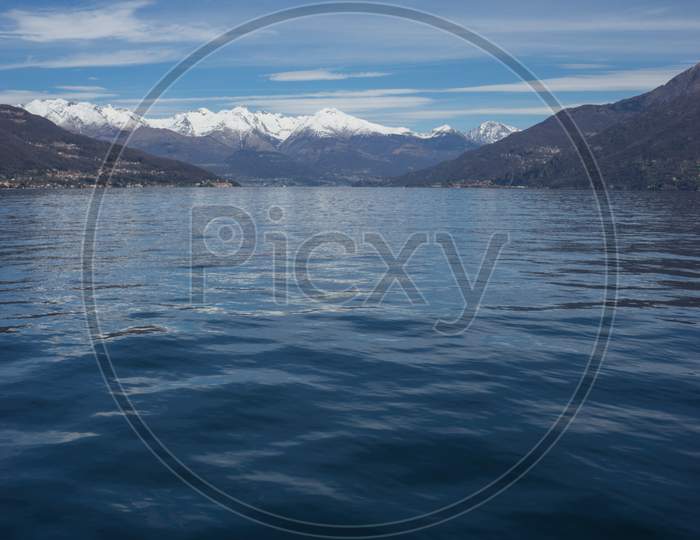 Italy, Menaggio, Lake Como, A Large Body Of Water