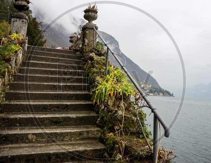 Italy, Varenna, Lake Como, Stone Steps Beside The Lake