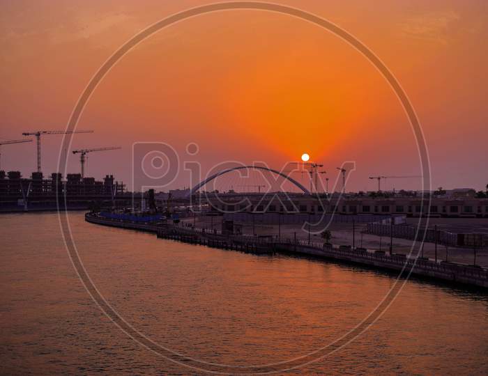 Golden sunset view from Dubai water canal