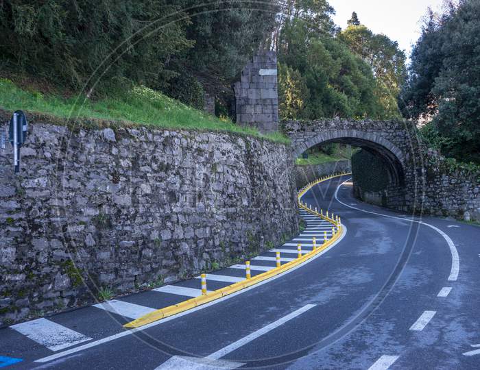 Italy, Bellagio, Lake Como, Road Passing Through Arch Bridge