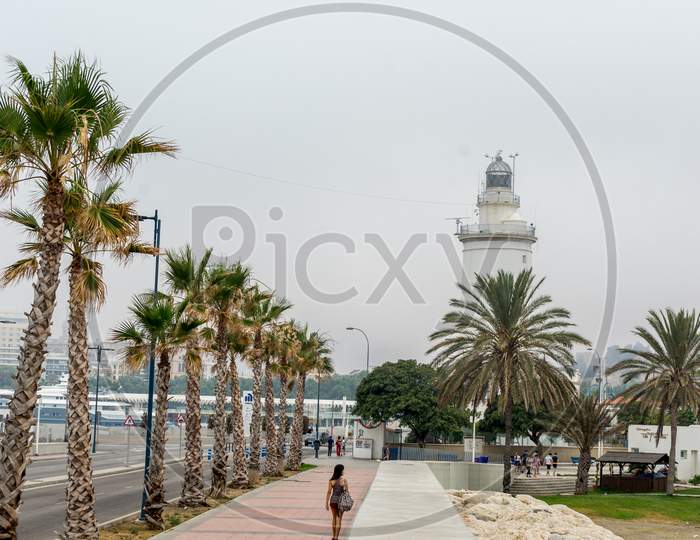 The Lighthouse At Malagueta Beach In Malaga, Spain, Europe