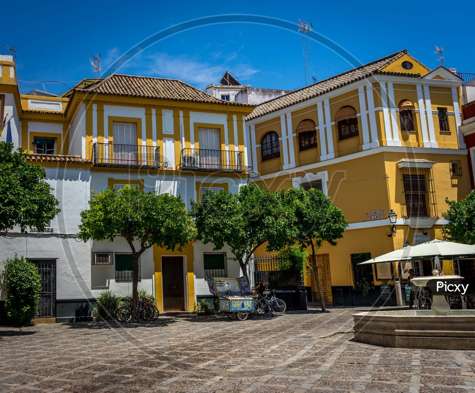 A View Of The Street In Seville On A Hot Summer Day With A Blue Sky In Seville, Spain, Europe