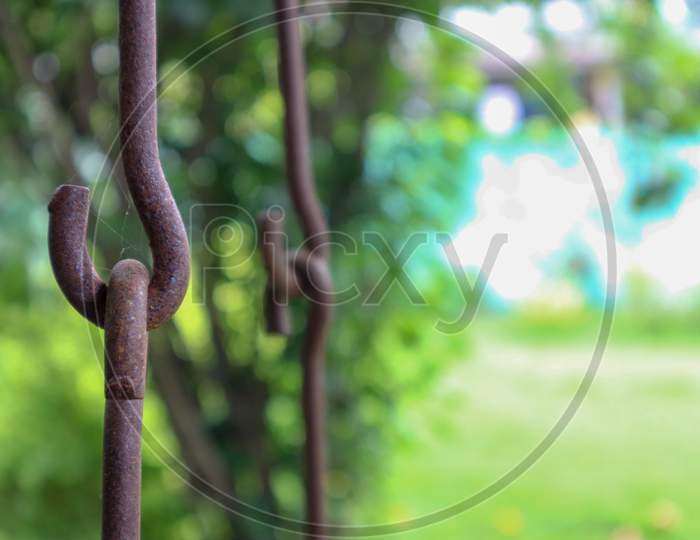 Rusty Metallic Chains Holding Together. Swing Metal Chain Links Closeup.