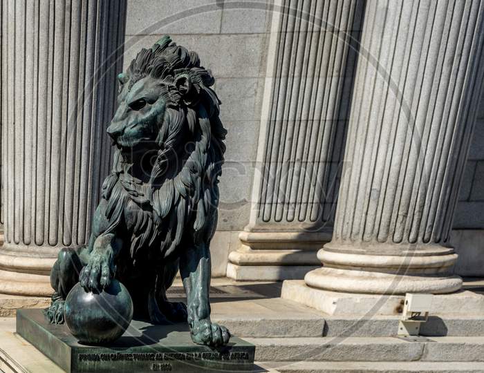 Lion Sculpted Out Of Stone In Madrid, Spain, Europe