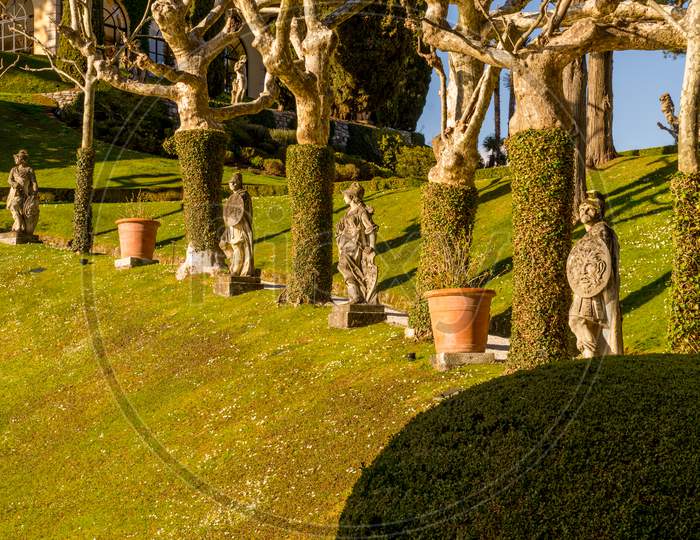 Lecco, Italy-April 1, 2018: Statue In Garden Of The Famous Villa Del Balbianello At Lecco, Lombardy