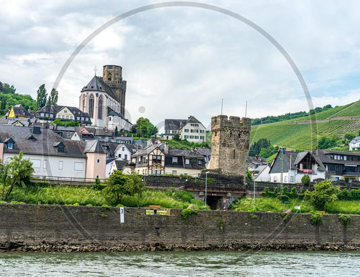 Germany, Rhine Romantic Cruise, A Castle Surrounded By A Body Of Water