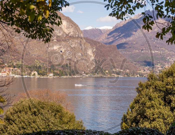 Italy, Bellagio, Lake Como, Cadenabbia, Scenic View Of Lake And Mountains Against Sky