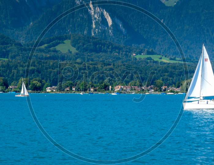 Switzerland, Interlaken, August 16,2009: A Yacht Speeds Across The Lake In Interlaken