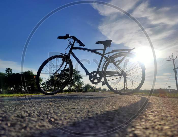 Macro cycling behind the sun photo