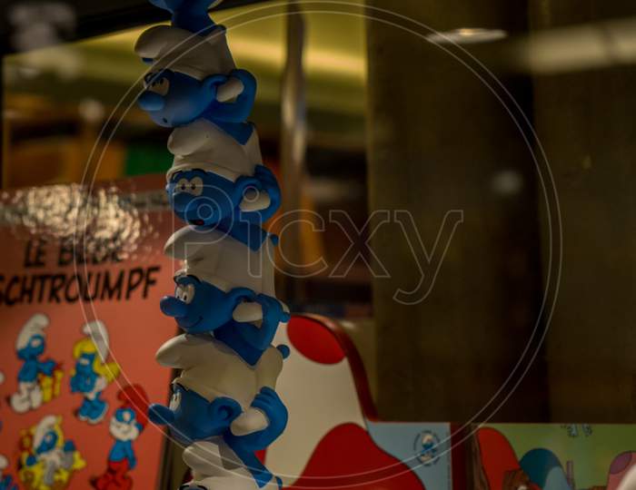 Brussels, Belgium - April 2017: A Bust Of Cartoon Character Smurfs In Brussels, Belgium