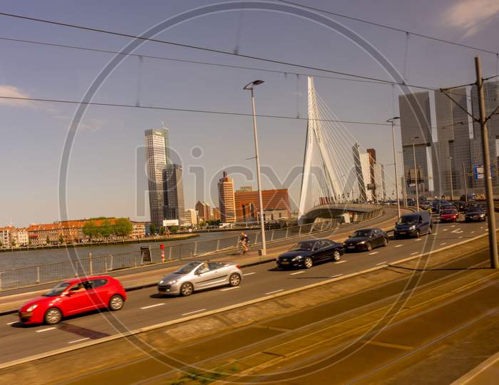 Rotterdam, Netherlands - 27 May: Cars Over The Erasmus Bridge At Rotterdam On 27 May 2017. Rotterdam Is A Major Port City In The Dutch Province Of South Holland