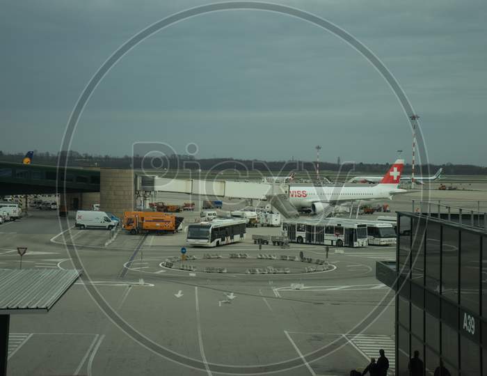 Milan Airport, Italy-April 2, 2018: Swiss Air Plane At The Milan Malpensa Airport