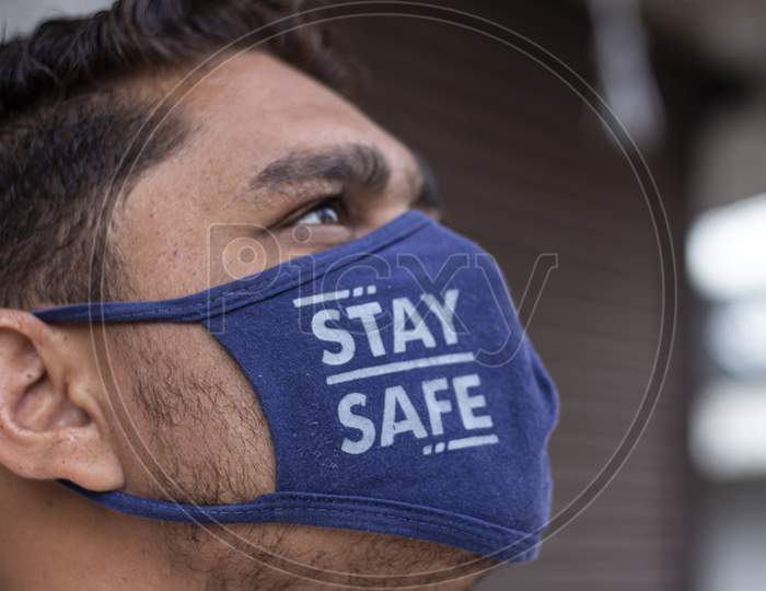 man wear stay safe mask