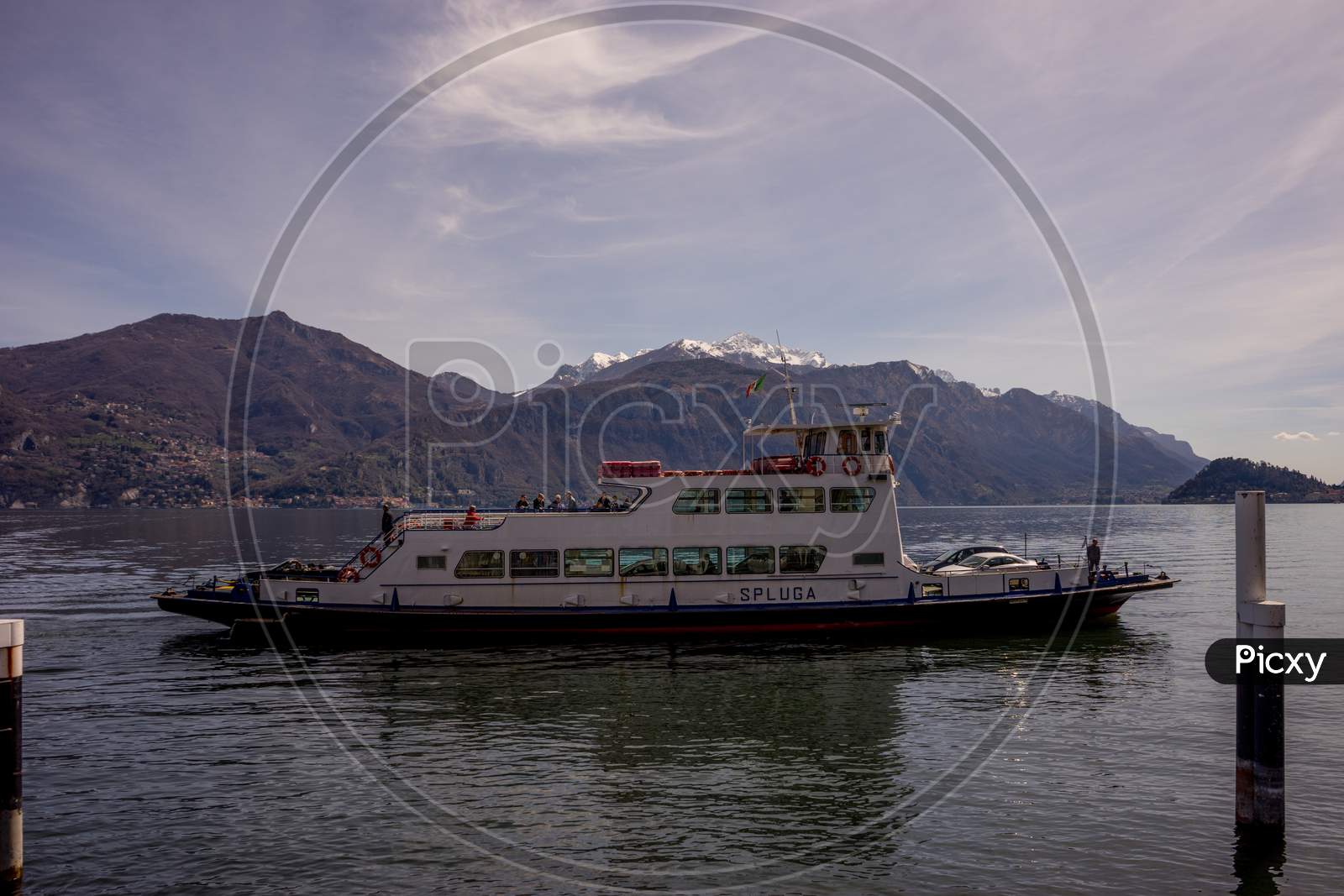 Menaggio, Italy-April 2, 2018: Spluga Ferry Boat On The Lake Como Transporting Cars And People