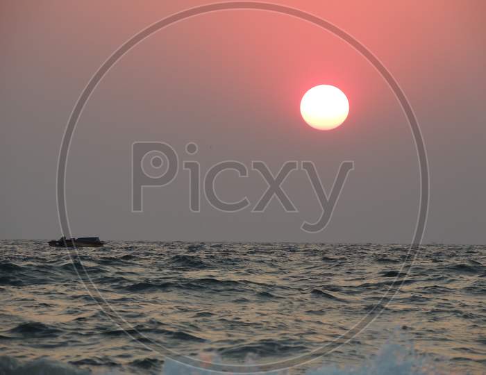 Fishing Boat and Sunrise
