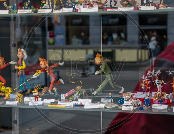 Brussels, Belgium - April 17 :  Memorabilia Of Tintin, The Cartoon Character Popularised By Herge Comics Displayed On A Shop Window At Brussels, Belgium, Europe On April 17.