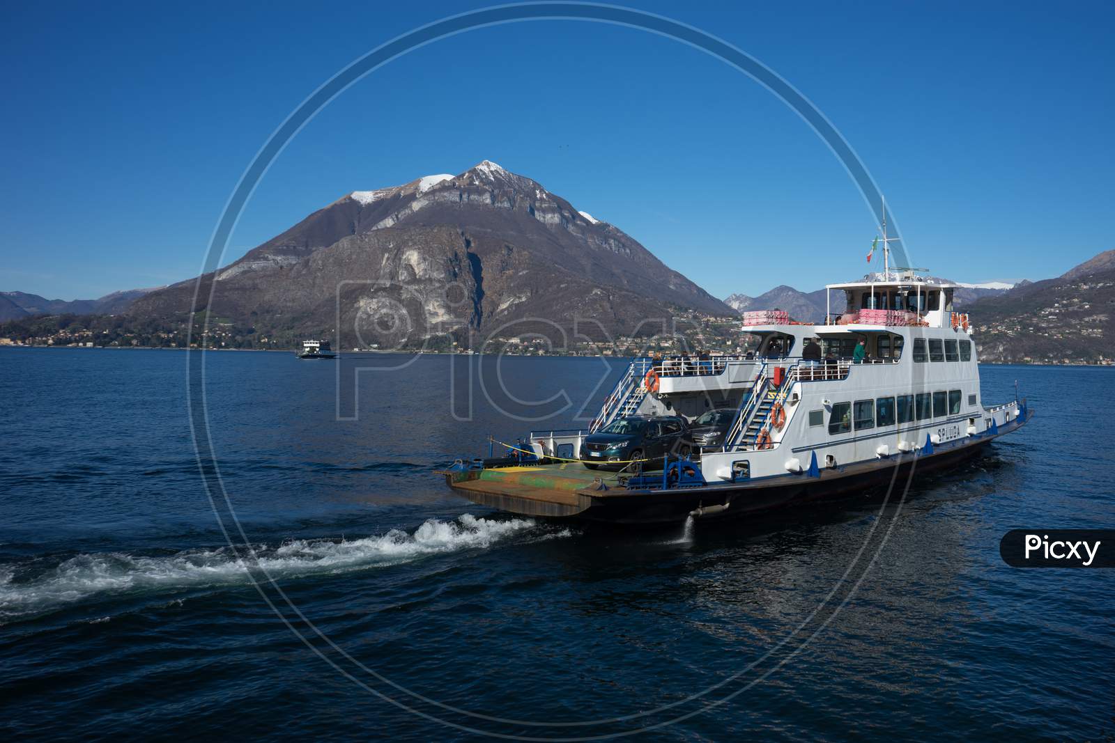 Menaggio, Italy-April 2, 2018: Transport Boat At Waterside Quay, Lombardy