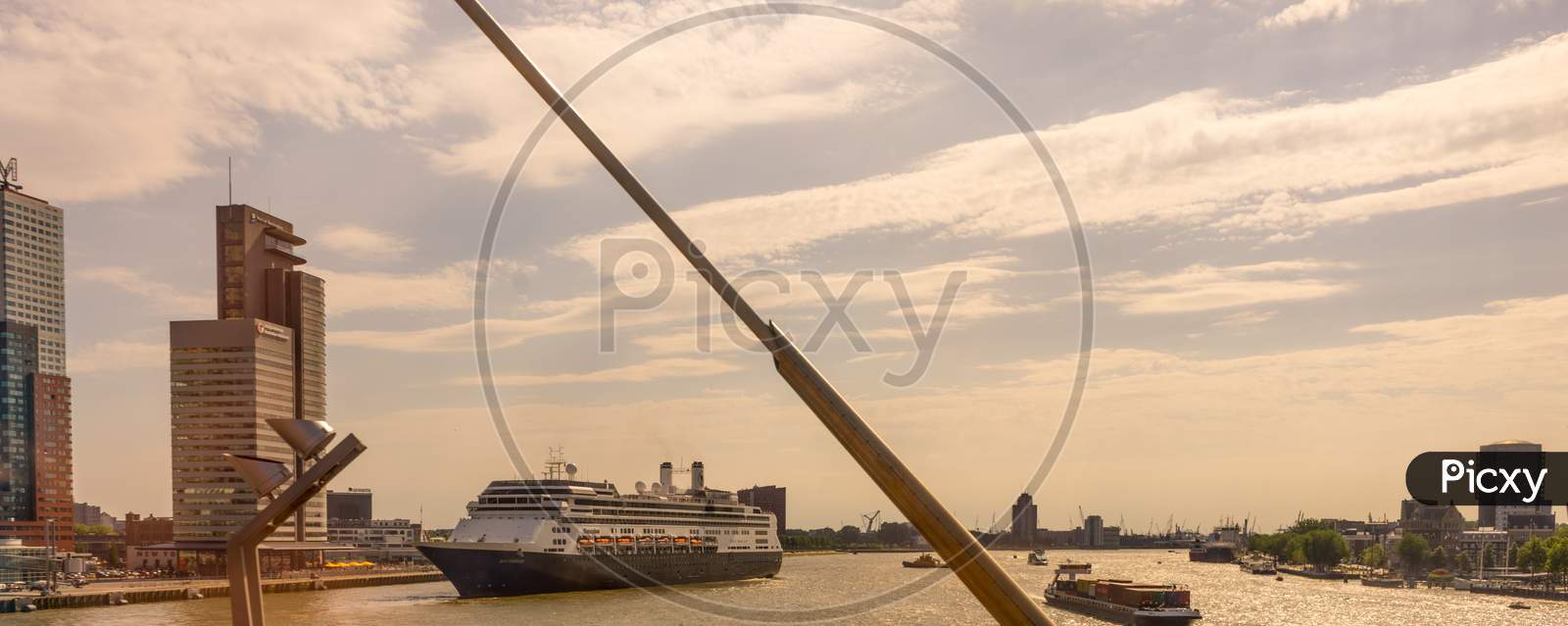 Rotterdam, Netherlands - 27 May: Erasmus Bridge At Rotterdam With Cruise Ship In Background On 27 May 2017. Rotterdam Is A Major Port City In The Dutch Province Of South Holland
