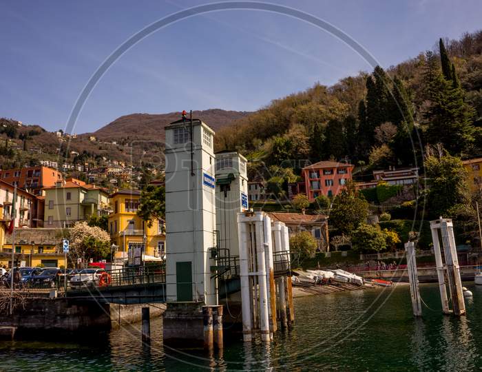 Menaggio, Italy-April 2, 2018: Varenna Waterside Dock At Quay