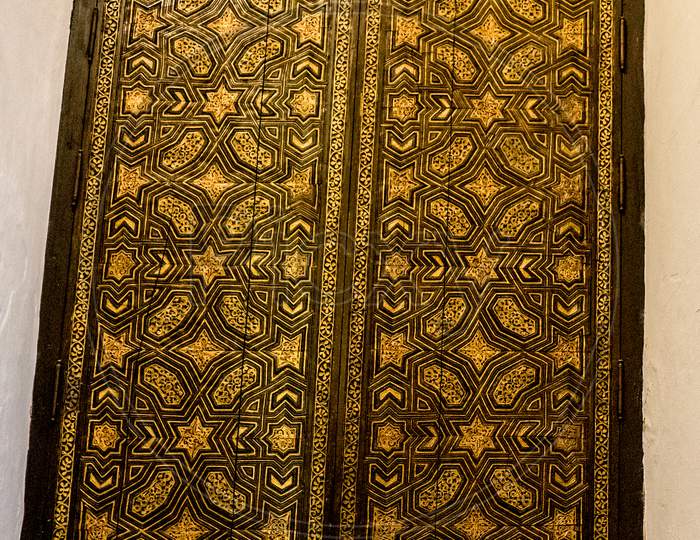 Seville, Spain- June 18, 2017 : Intricate Arabic Muslim Moorish Design Is Displayed On A Door At The Alcazar Palace In Seville, Spain June 2017
