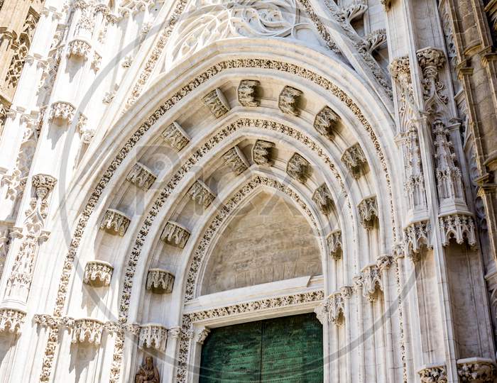 Seville, Spain- June 18, 2017: Design Patterns On The Doors Of The  Gothic Cathedral In Seville, Spain June 2017