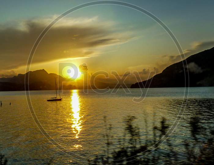 Switzerland, Lauterbrunnen, Scenic View Of Lake Against Sky During Sunset