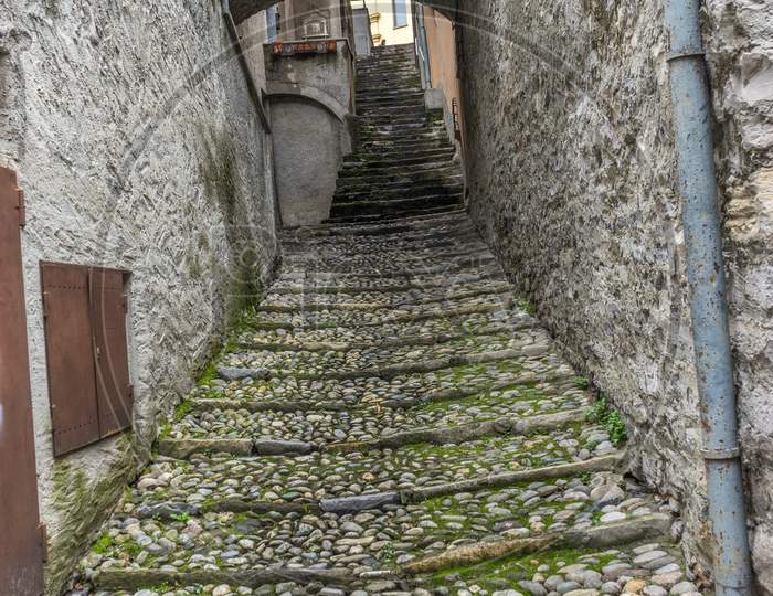 Italy, Varenna, Lake Como, Staircase Leading To Wall Of Building