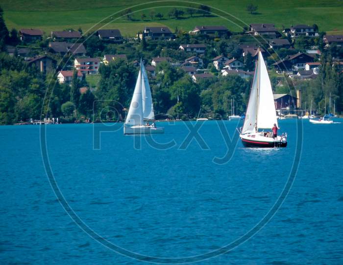 Switzerland, Lauterbrunnen, Sailboat Sailing On Sea