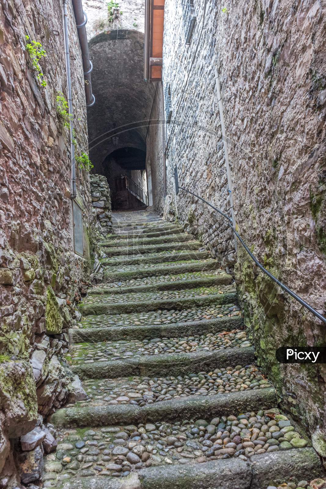 Italy, Varenna, Lake Como, Staircase Leading To Wall Of Building