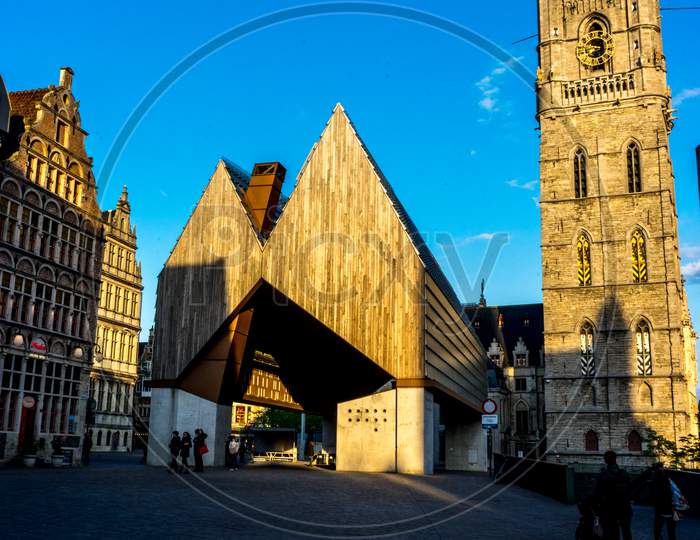 The Golden Sunlight Falling On The Belfry And New Market Area In Ghent, Belgium