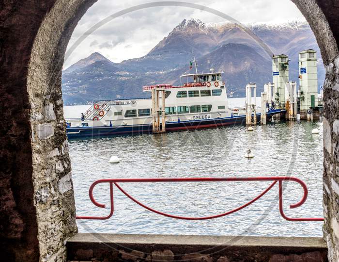 Varenna, Italy- March 31, 2018: A Spluga Boat On Lake Como Next To The Village Of Varenna