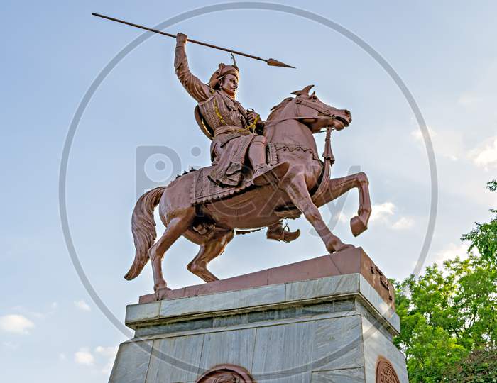 In War Action Statue Of Bajirao Peshwe In Front Of Heritage Structure, Shaniwarwada.