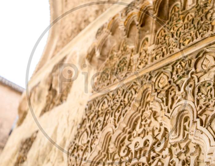 Seville, Spain- June 18, 2017 : Intricate Moorish Design Is Displayed Over An Arch At The Alcazar Palace In Seville, Spain June 2017.