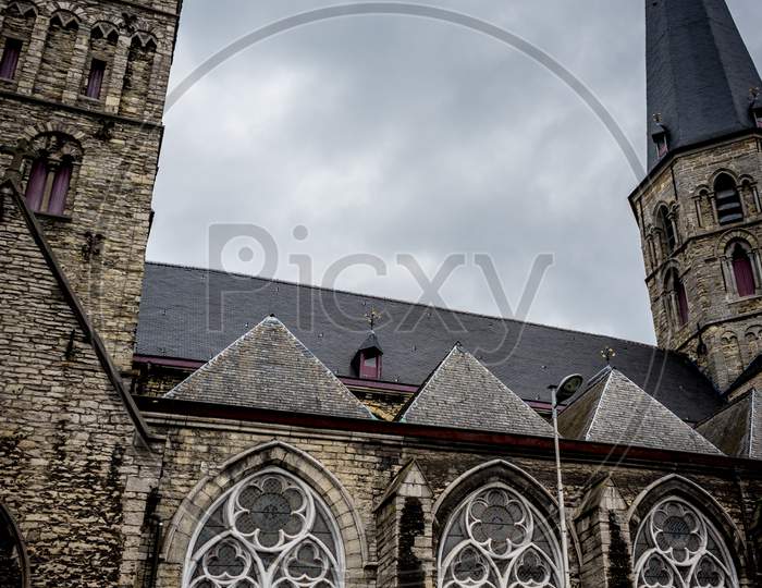 Sint-Jacobskerk Monumental Church Featuring 12Th-Century Romanesque Towers & A 13Th-Century Gothic Central Spire In Gent, Belgium