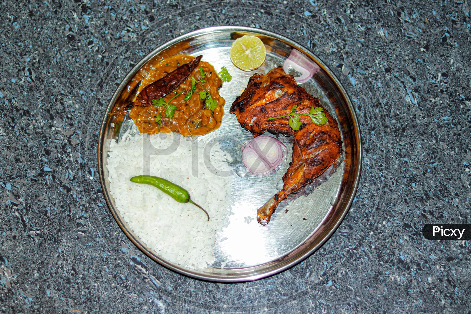 Rice daal fry and chiken tandoori