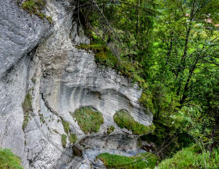 Switzerland, Lauterbrunnen, Scenic View Of Waterfall In Forest