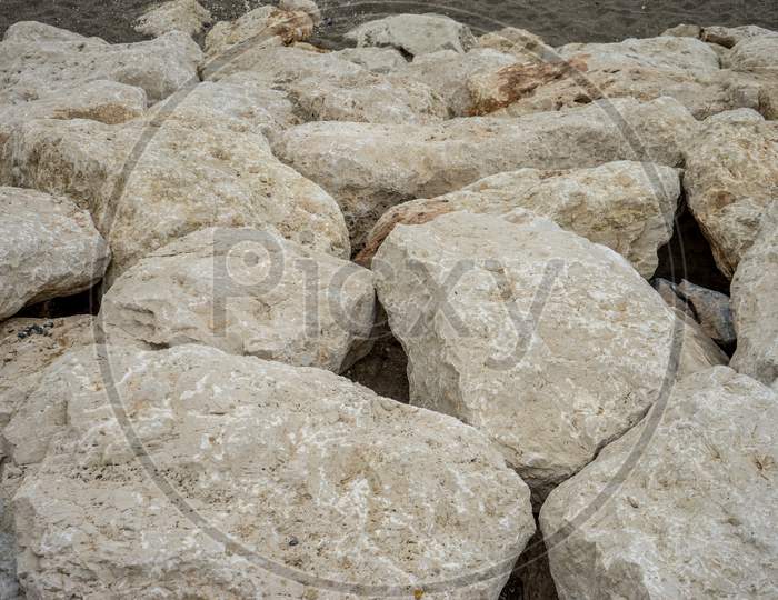 Stone Along The Malagueta Beach In Malaga, Spain, Europe