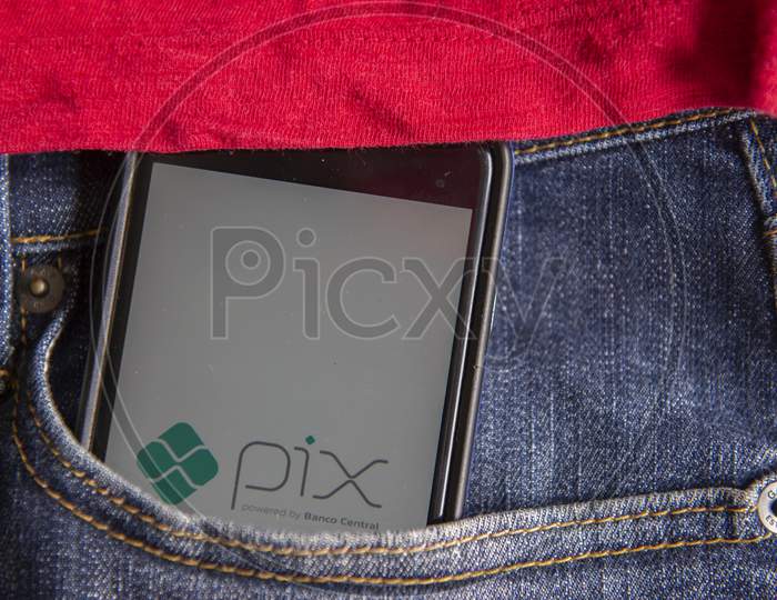 Florianopolis, Brazil. 28/09/2020: Close Up Of Pix Logo On Smartphone Screen In Jeans Pocket. Pix Is ​​The New Brazilian Electronic Payment System. Brazilian Central Bank.