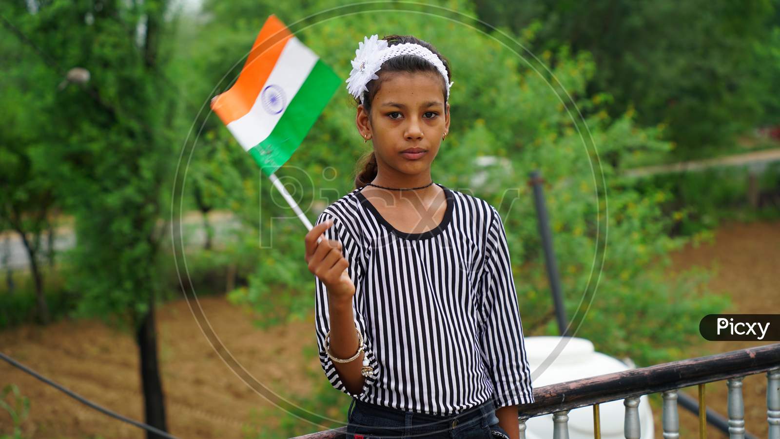 20 September 2020 : Reengus, Jaipur, India / Cute Little Girl With Indian National Tricolour Flag